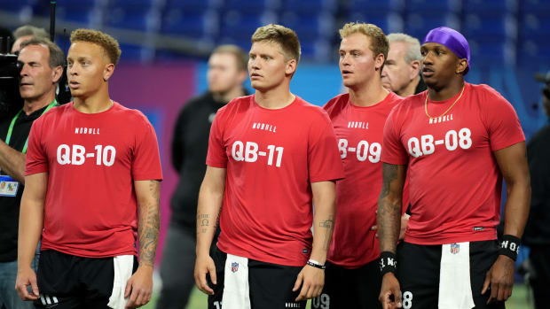 South Carolina quarterback Spencer Rattler (QB10), Western Kentucky quarterback Austin Reed (QB11), Tulane quarterback Mike Pratt (QB09) and Washington quarterback Michael Penix (QB08) during the 2024 NFL Combine at Lucas Oil Stadium.
